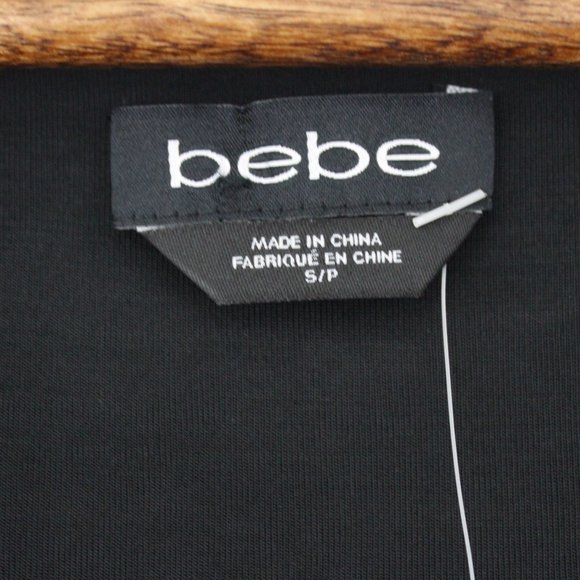 ⬇️$15 Bebe Black & White Cold Shoulder V-Neck Top - Picture 13 of 16